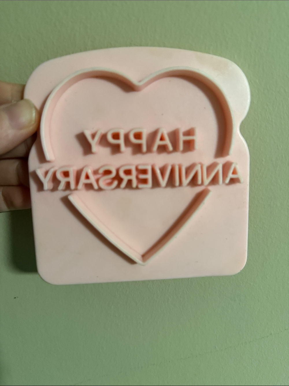 Happy Anniversary" cookie cutter and stamp with a heart outline